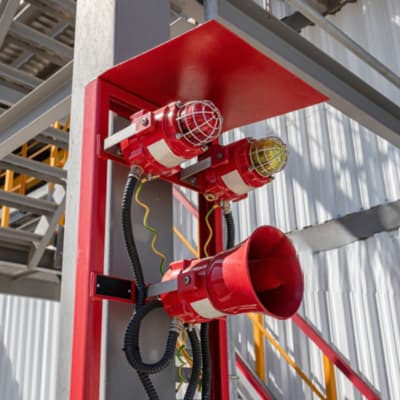 Photo of red alarm siren and red flasher