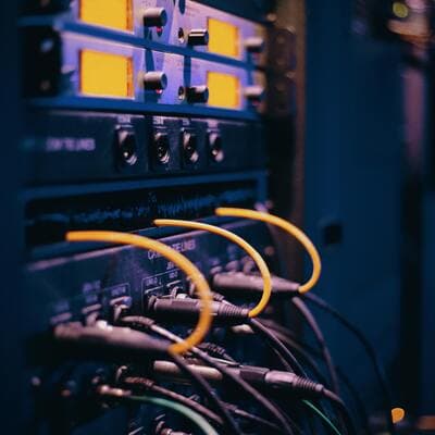 Photo of data cables attached to the back of an electronic gadget