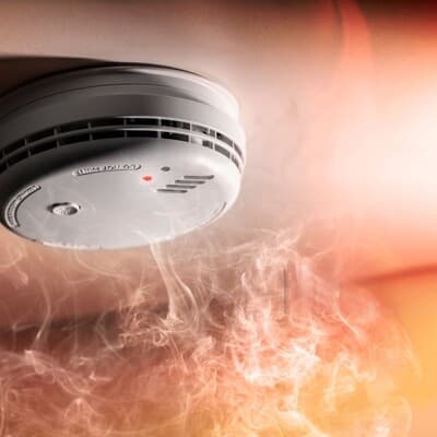 Smoke detector and interlinked fire alarm.