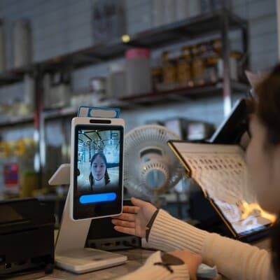 Face recognition payment at a retail store.